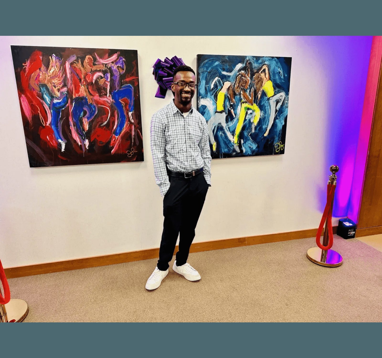 Johnson Simon with his artwork